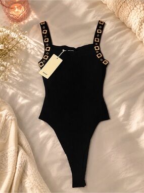 Black Ribbed Girls' One-Piece Bodysuit with Gold Eyelet Straps